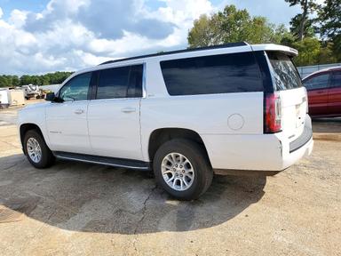 Vedere 2020 GMC YUKON XL C1500 SLT, unghi 2