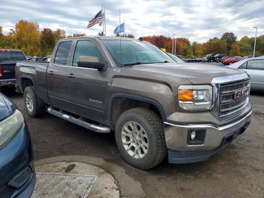 Vista de 2014 GMC SIERRA K1500 SLE, ángulo 4