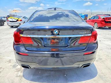 Вид 2014 BMW 750 LI, угол 6