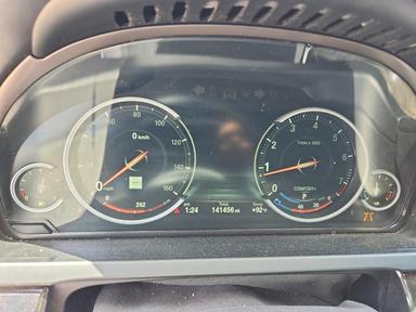 Вид 2014 BMW 750 LI, угол 9