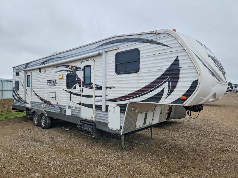 2013 FOREST RIVER PUMA CAMPER