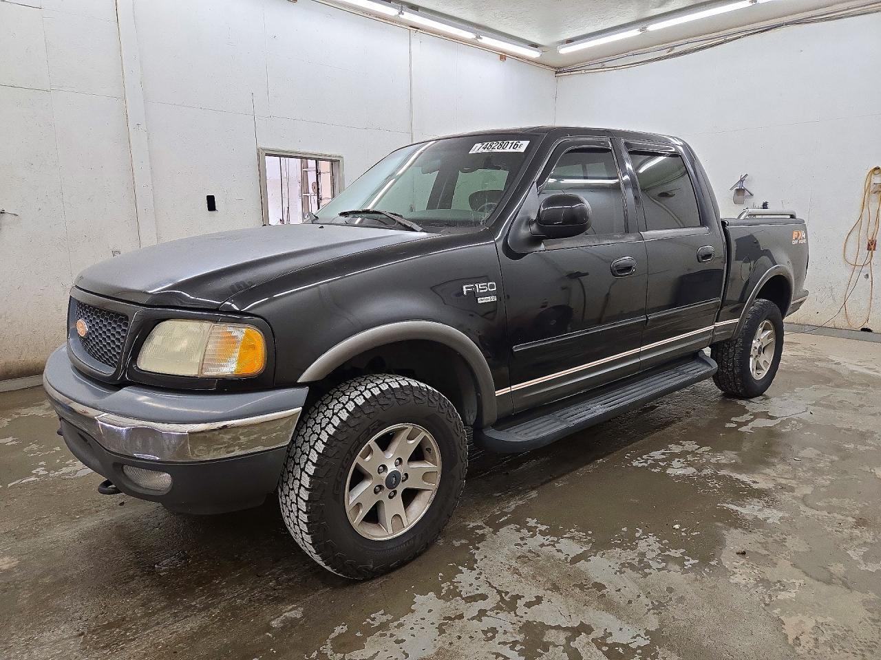 Vista de 2003 FORD F150 SUPERCREW, ángulo 1