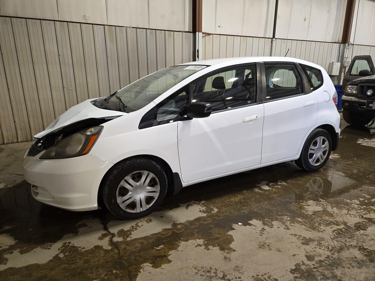 Вид 2009 HONDA FIT, угол 1