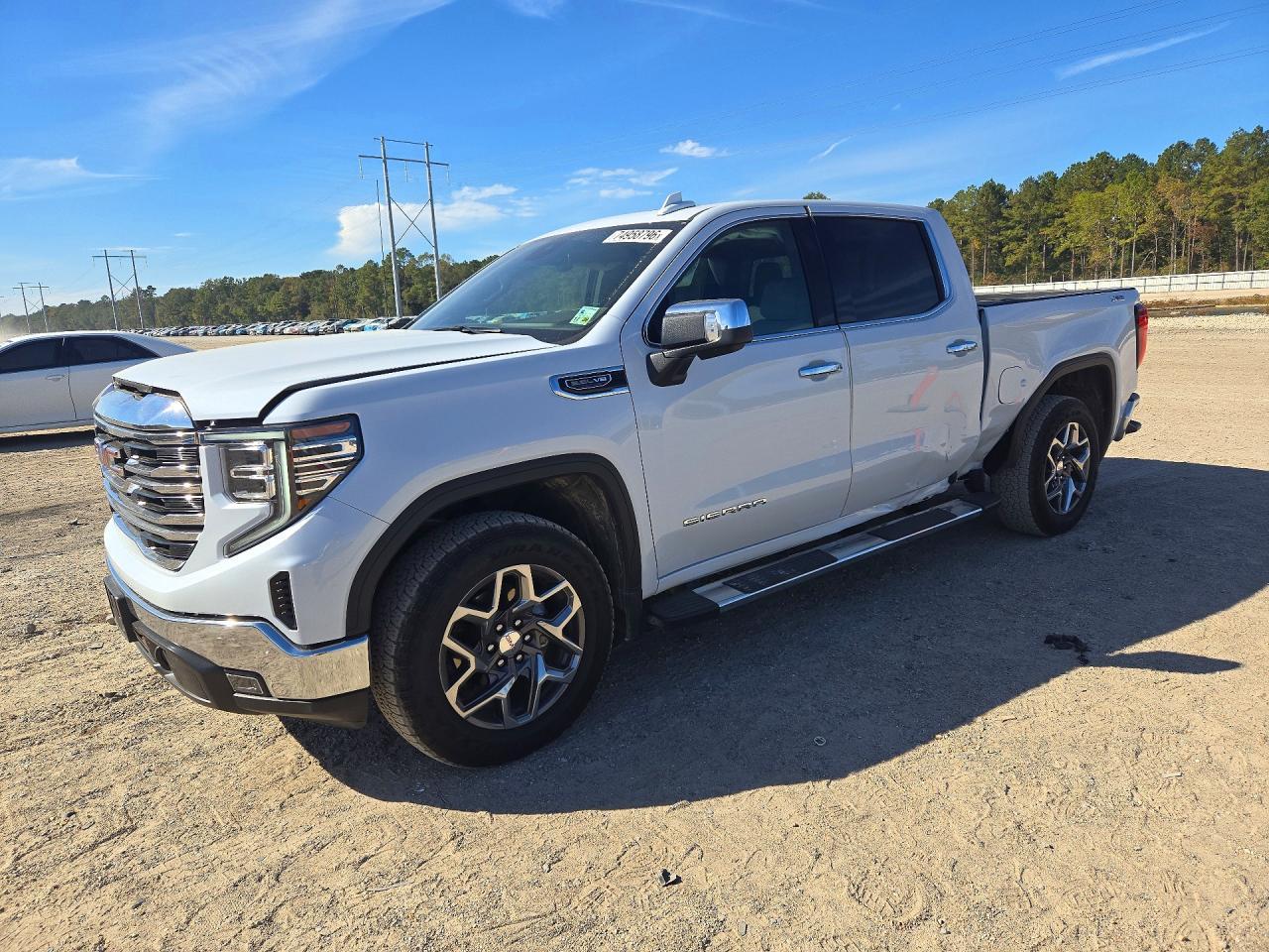 Vista de 2026 GMC SIERRA K1500 SLT, ángulo 1