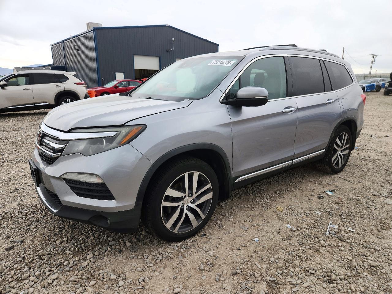 منظر 2016 HONDA PILOT TOURING، زاوية 1