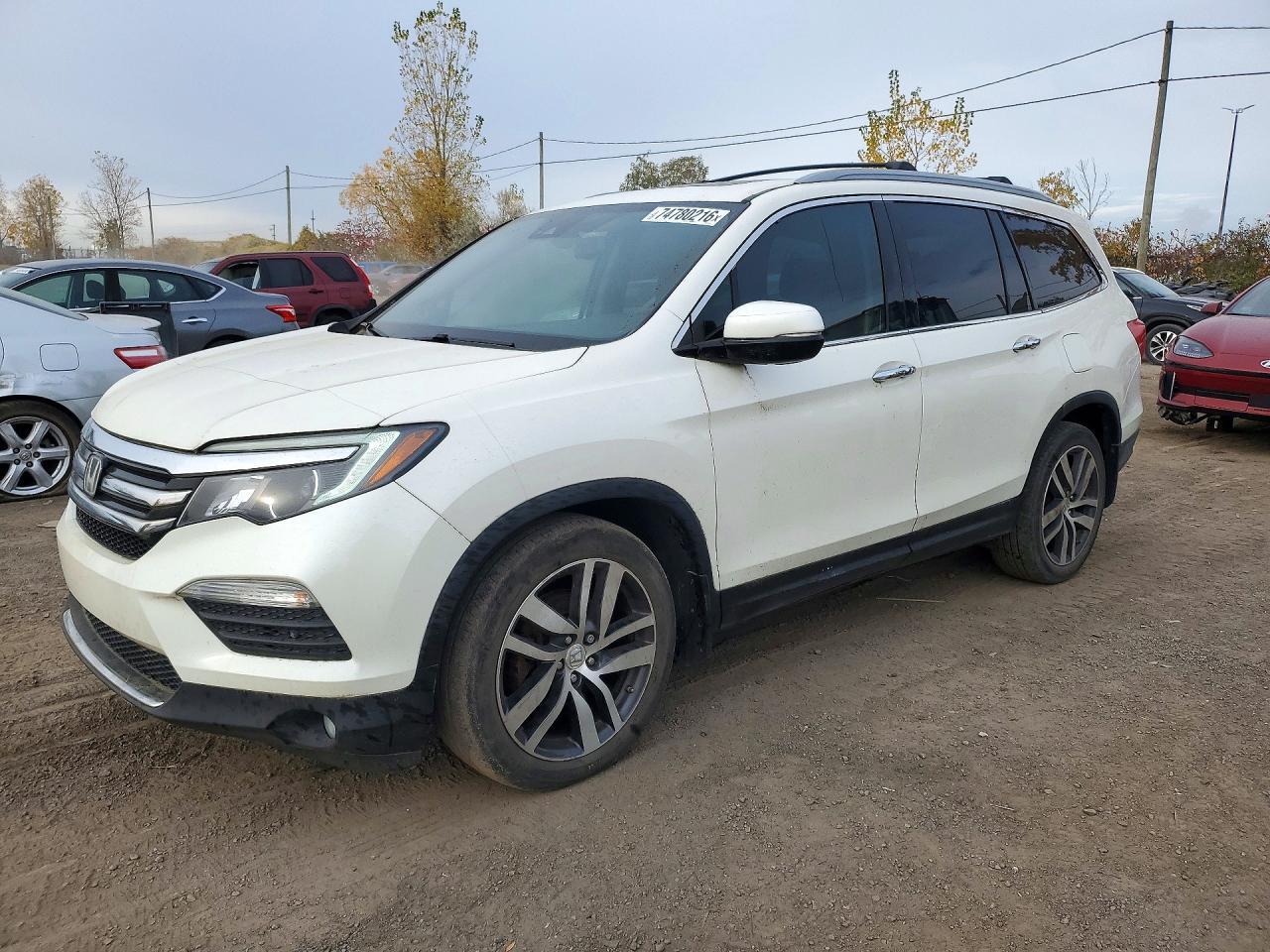 Vedere 2016 HONDA PILOT TOURING, unghi 1