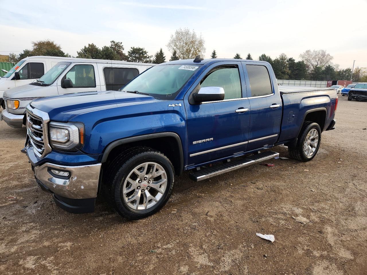 Вид 2018 GMC SIERRA K1500 SLT, угол 1