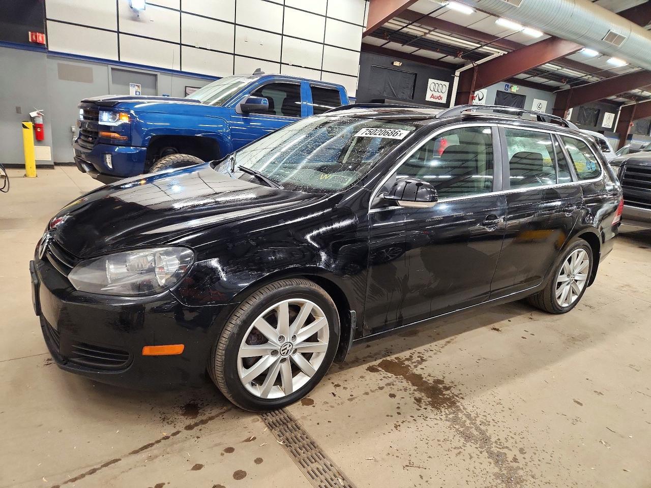Vista de 2014 VOLKSWAGEN JETTA TDI, ángulo 1