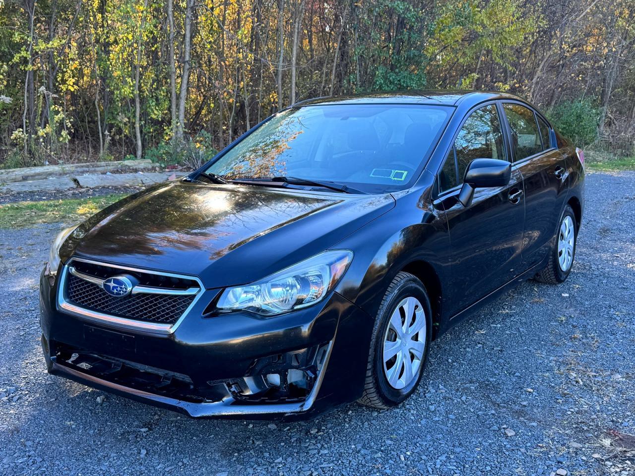 Vue de 2016 SUBARU IMPREZA, angle 1