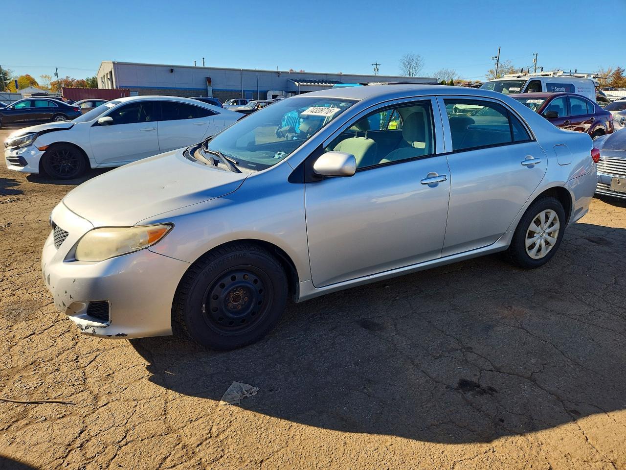 Vista de 2009 TOYOTA COROLLA LE, ángulo 1