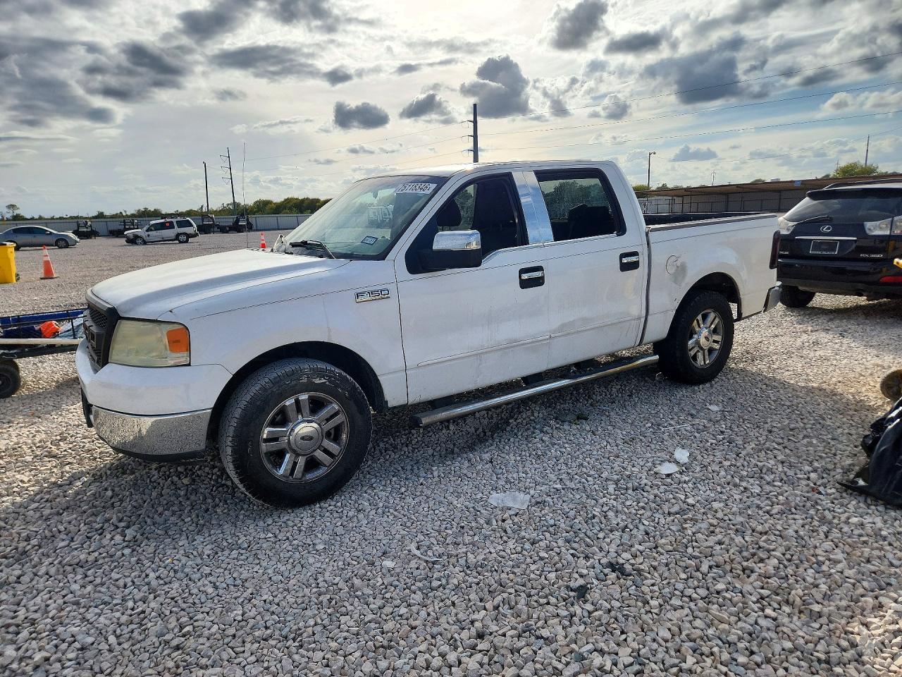 منظر 2005 FORD F150 SUPERCREW، زاوية 1