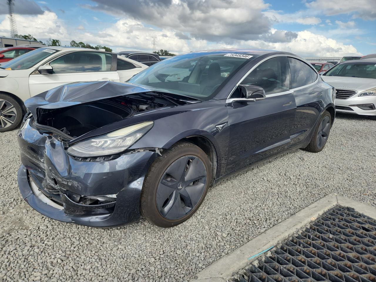 Vue de 2018 TESLA MODEL 3, angle 1