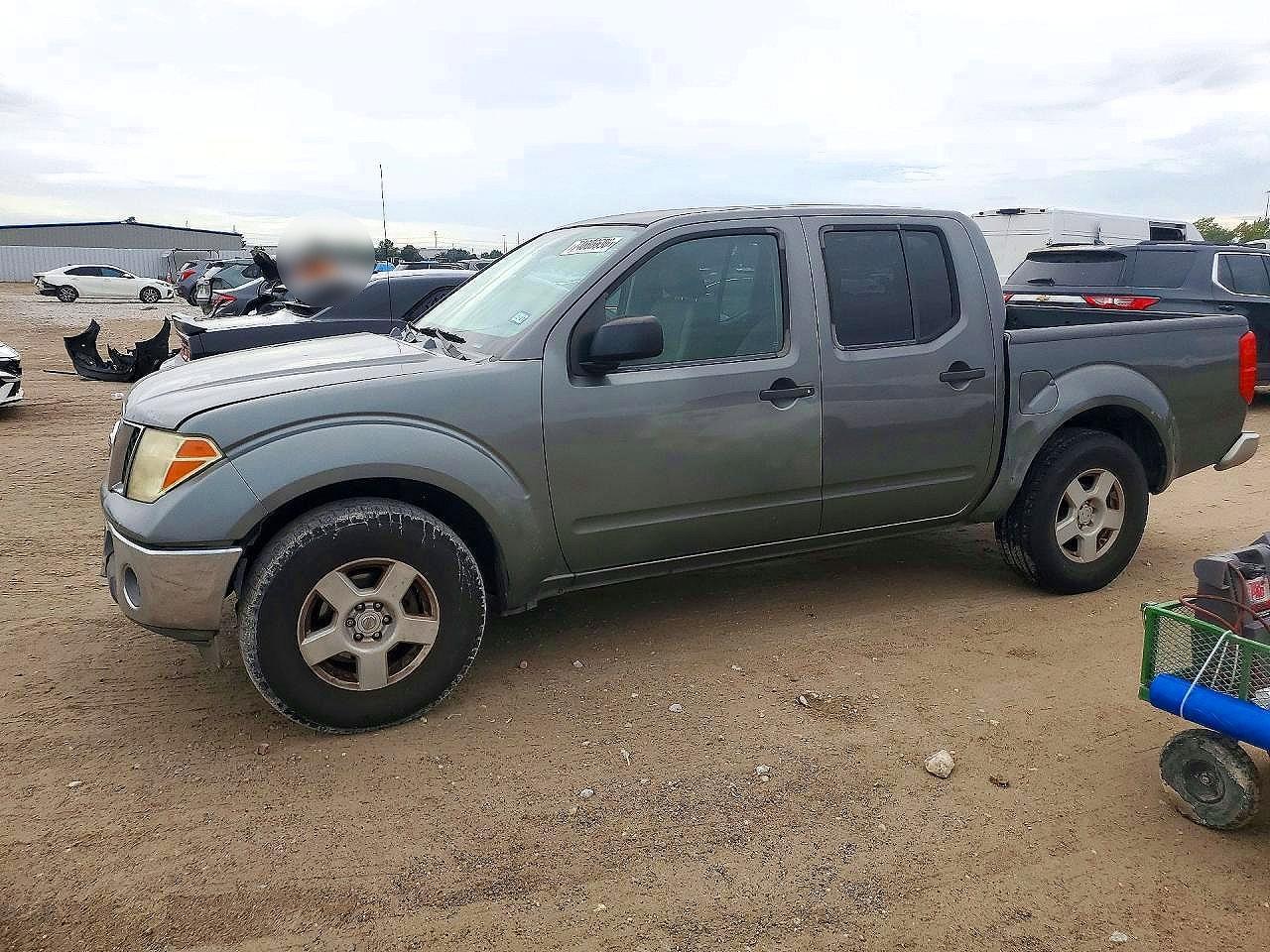 منظر 2006 NISSAN FRONTIER SE، زاوية 1