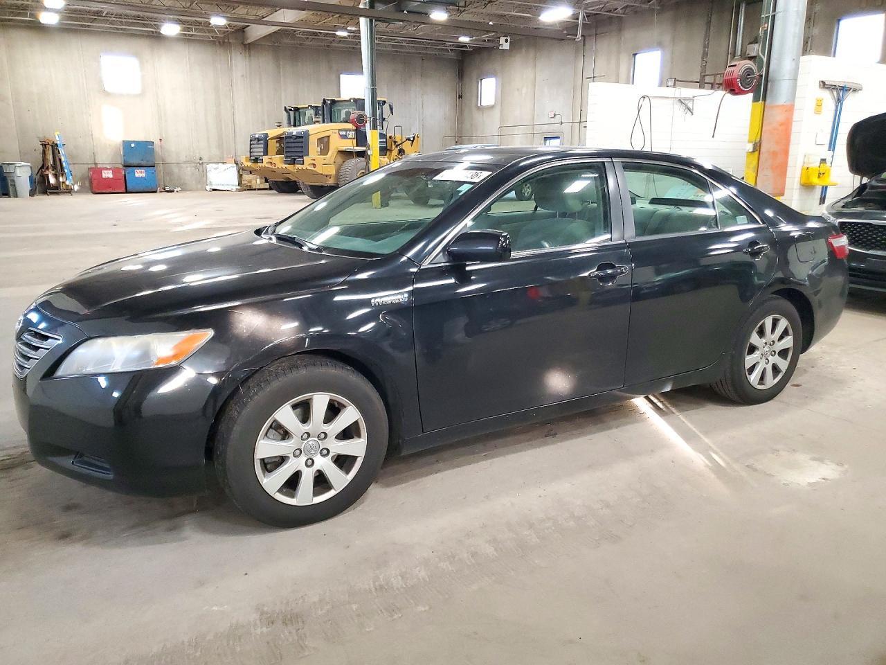Vue de 2009 TOYOTA CAMRY HYBRID, angle 1