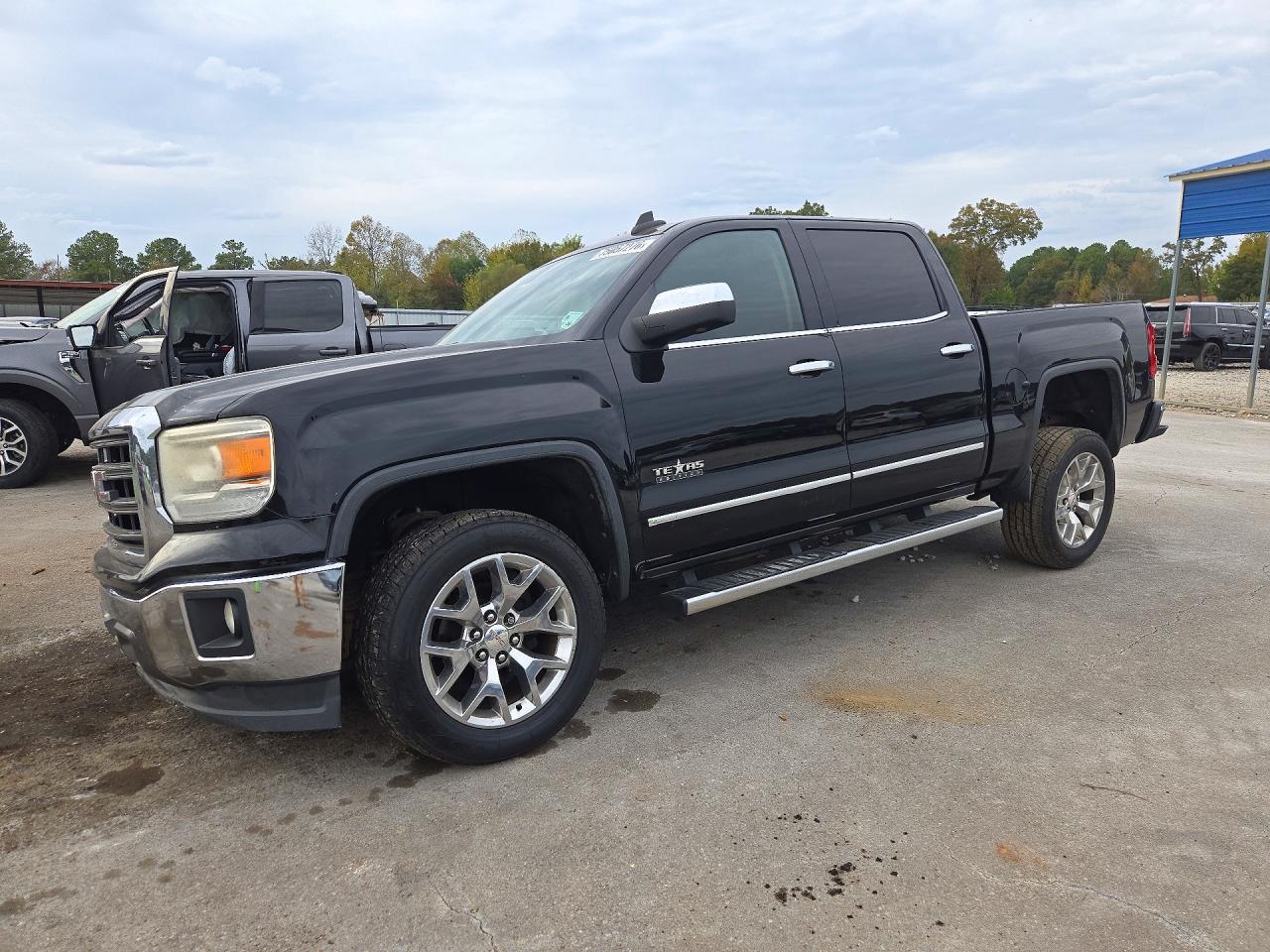 Вид 2015 GMC SIERRA C1500 SLT, угол 1