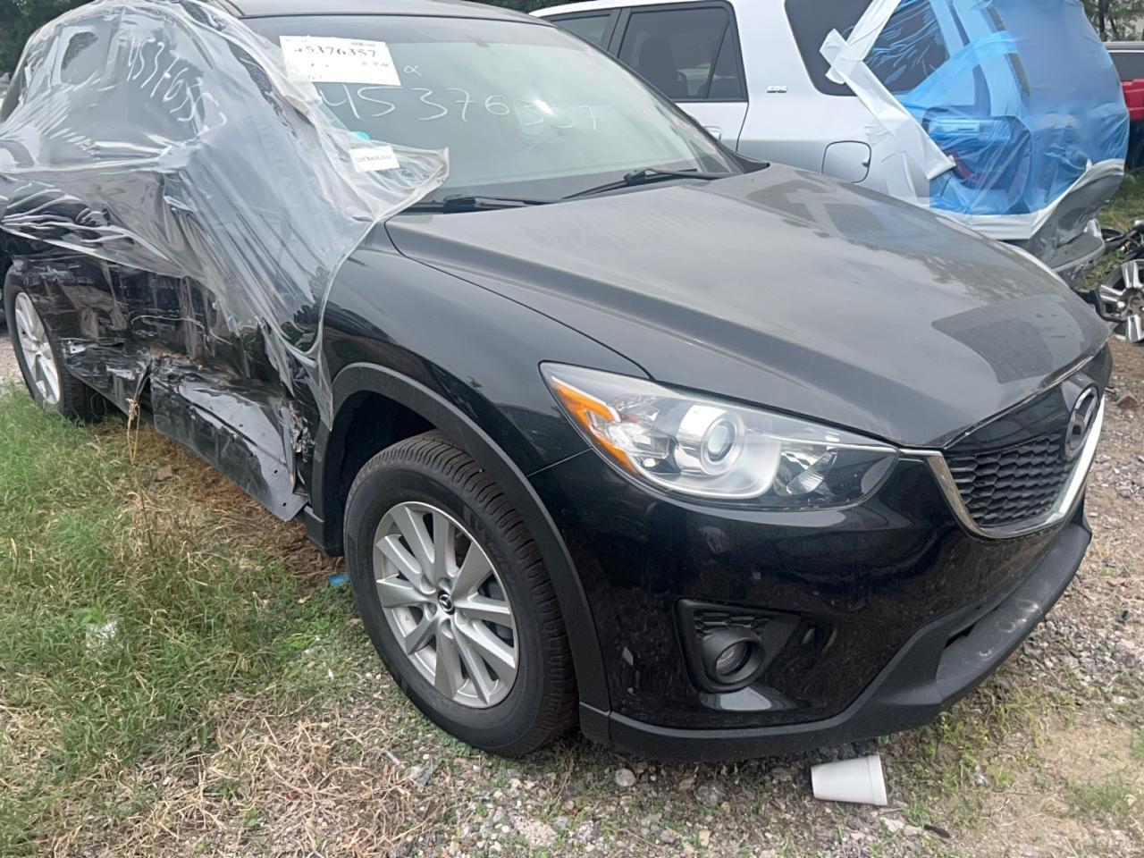 Vue de 2014 MAZDA CX 5 TOURING, angle 1