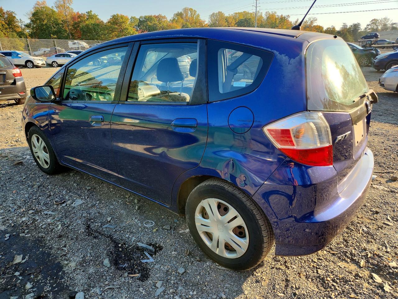 Vue de 2009 HONDA FIT, angle 1