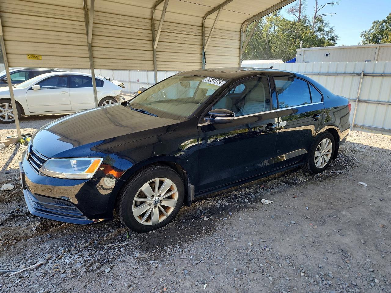 Vista de 2015 VOLKSWAGEN JETTA SE, ángulo 1