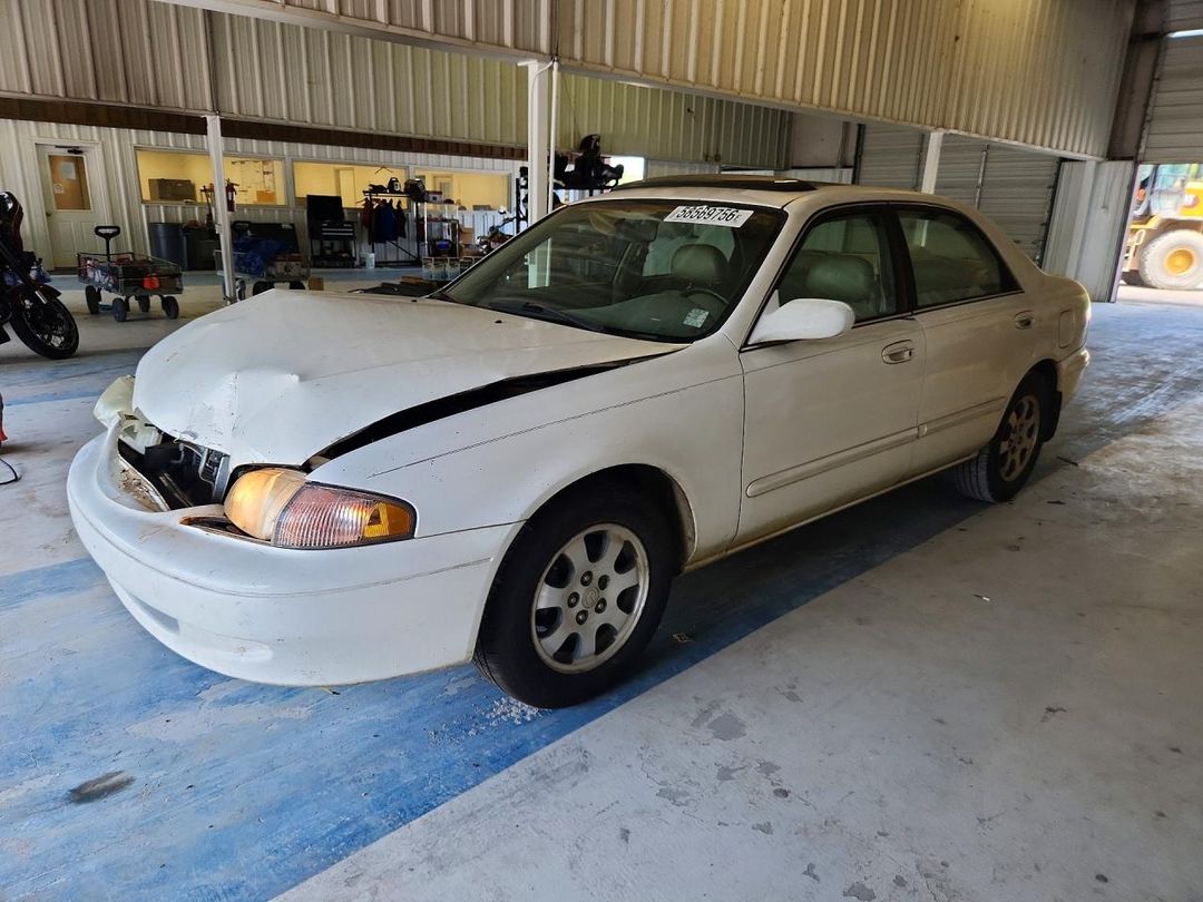 منظر 1998 MAZDA 626 DX، زاوية 1