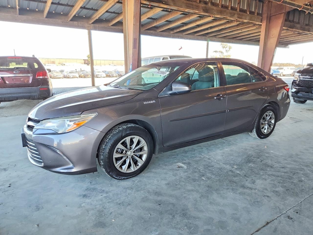 Вид 2016 TOYOTA CAMRY HYBRID LE, угол 1