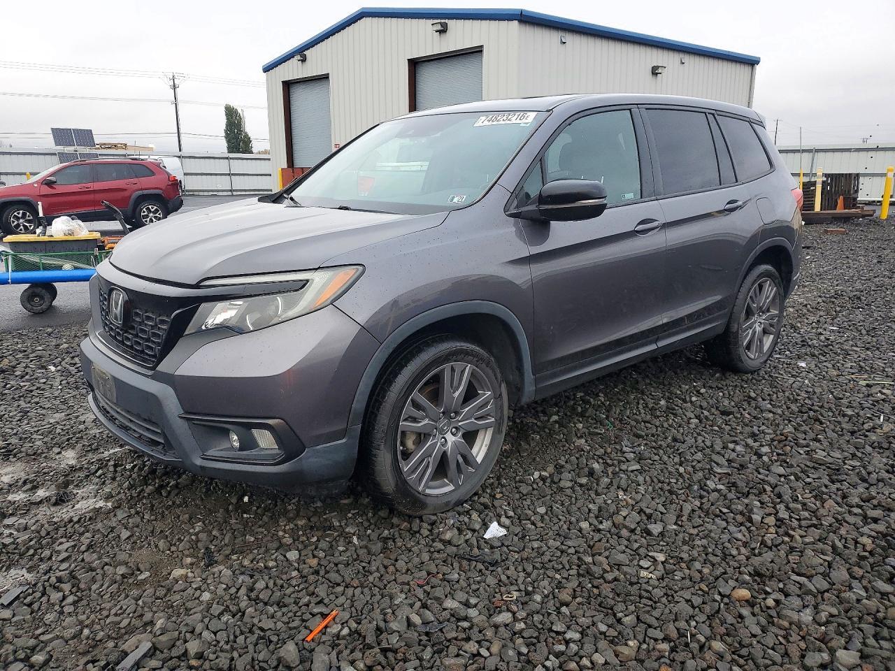 منظر 2019 HONDA PASSPORT EXL، زاوية 1