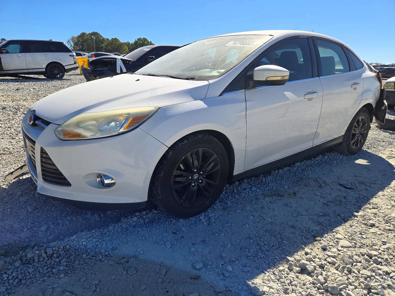 Вид 2012 FORD FOCUS SEL, угол 1