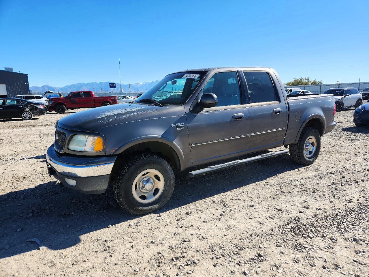 منظر 2003 FORD F150 SUPERCREW، زاوية 1
